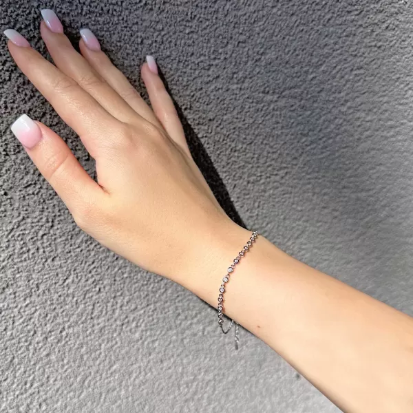 Stříbrný náramek s malými zirkony 13031.1