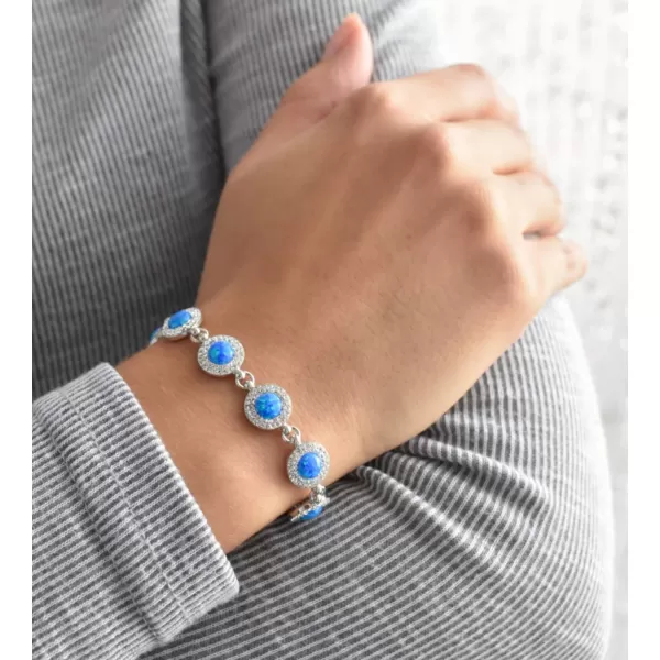 Stříbrný náramek se syntetickým opálem a krystaly Preciosa modrý 33105.1