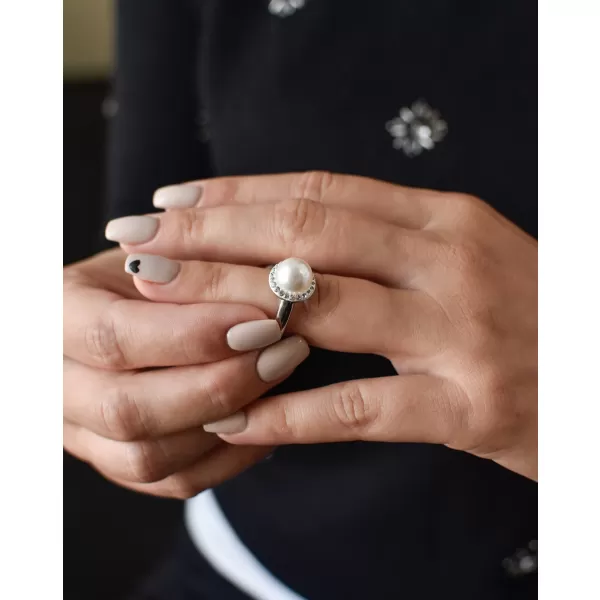 Stříbrný prsten s krystaly Swarovski a bílou perlou 35021.1