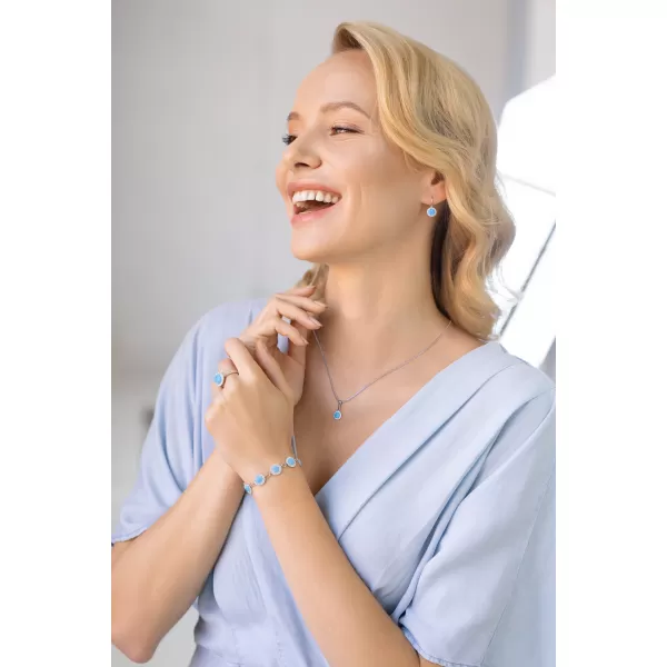 Stříbrný náramek se syntetickým opálem a krystaly Preciosa světle modrý 33105.1