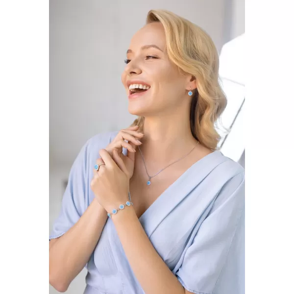 Stříbrné náušnice pecky se syntetickým opálem a Preciosa krystaly světle modré kulaté 31217.1 lt.blue