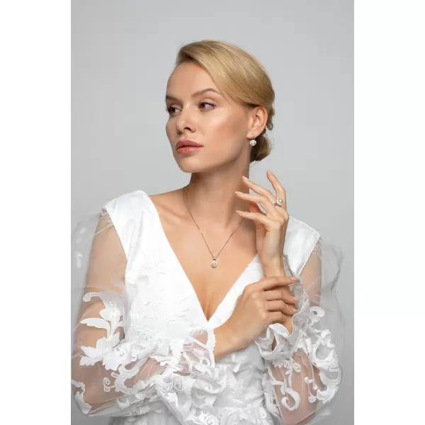 Stříbrný prsten s krystaly Swarovski a bílou perlou 35021.1