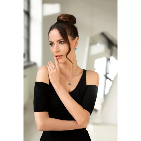 Stříbrný prsten se syntetickým opálem modrý kulatý 15001.3