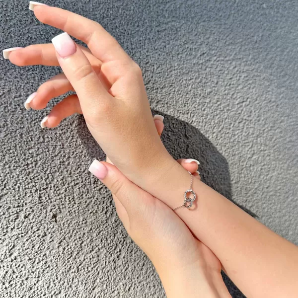 Stříbrný náramek kroužky se zirkony 13032.1