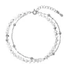 Stříbrný dvojitý náramek s bílými howlity 13115.1