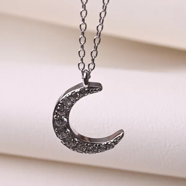 Stříbrný náhrdelník půlměsíc se zirkony 12176.1