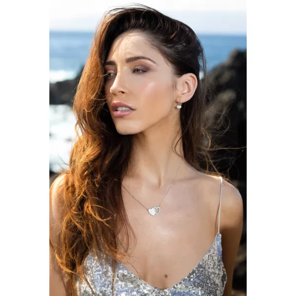 Stříbrné náušnice visací s krystaly Swarovski bílé srdce 31125.1