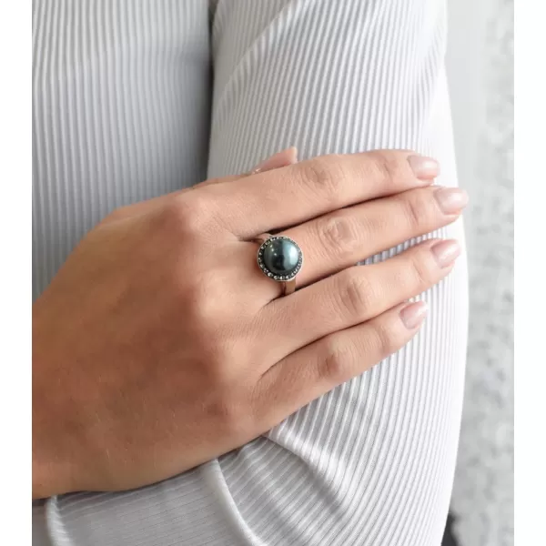 Stříbrný prsten s krystaly Swarovski a zelenou perlou 35021.3