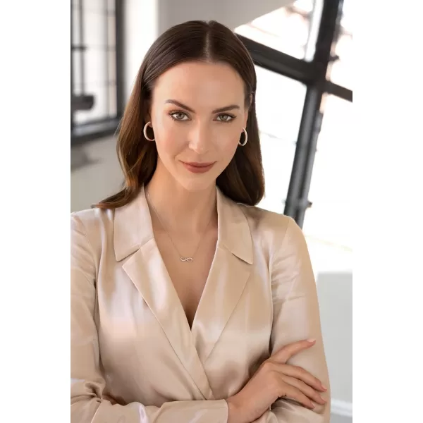 Stříbrný náhrdelník s krystaly Swarovski bílé infinity,osmička-nekonečno 32023.1