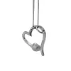 Stříbrný přívěsek s krystaly Swarovski růžové srdce 34183.3