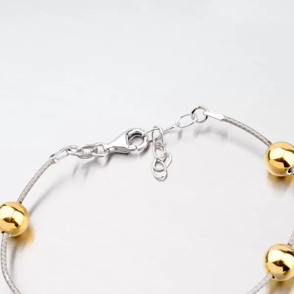 Stříbrný náramek se zlacenými kuličkami XKXC-4002-ES