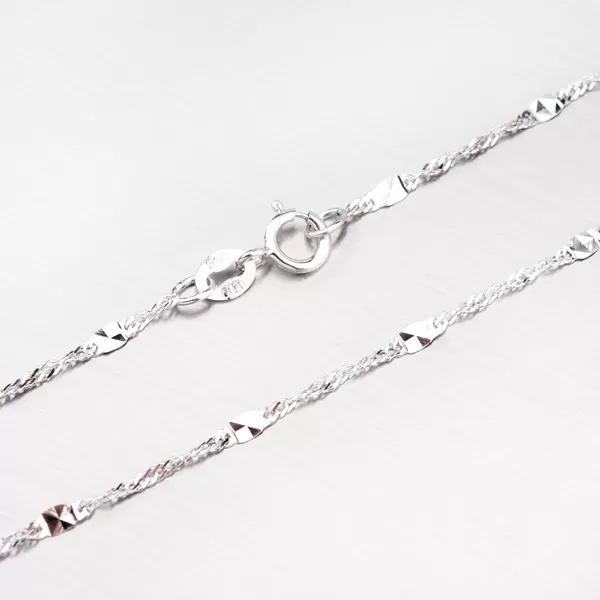 Zlatý náramek zdobený gravírovanými plíškami 44-1703