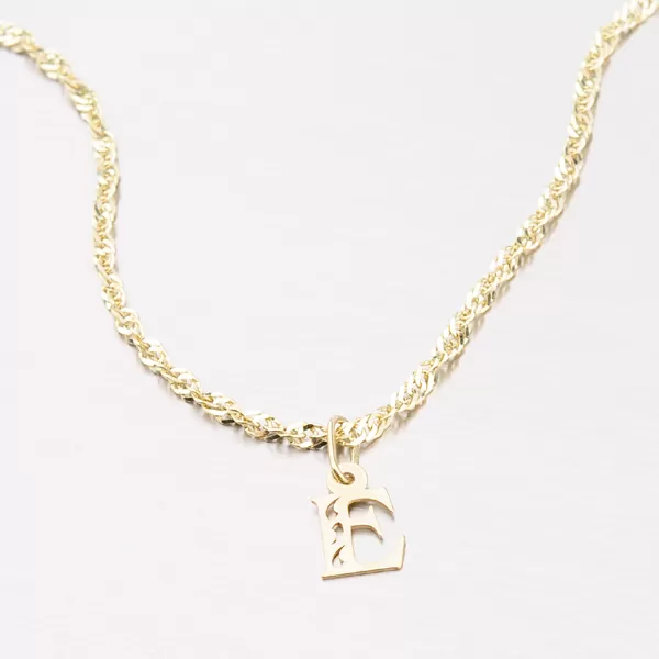 Přívěsek žluté zlato 585 písmeno E 442-0002-E