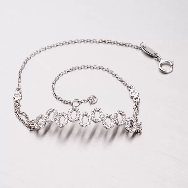 Zlatý náramek se zirkony 149-0657