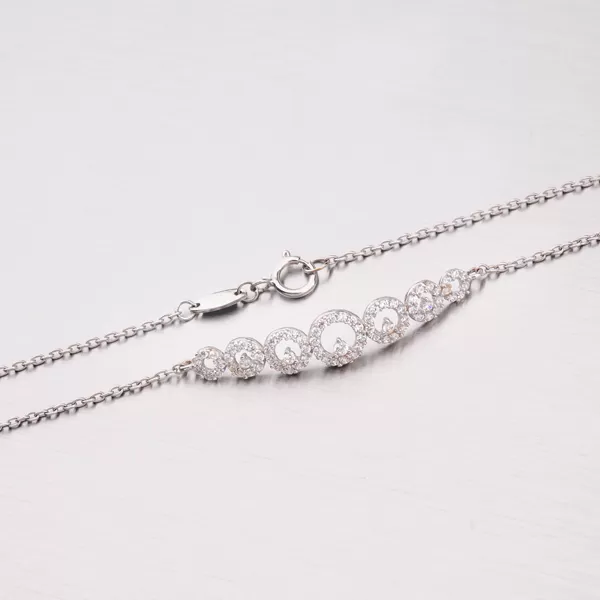 Zlatý náramek se zirkony 149-0659