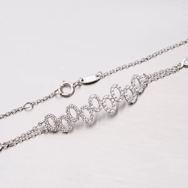 Zlatý náramek se zirkony 149-0657