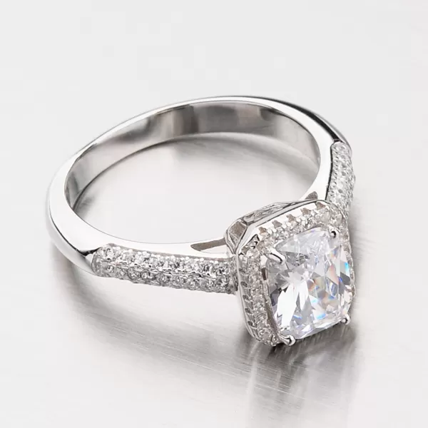 Stříbrný prsten se zirkony RXX04180319