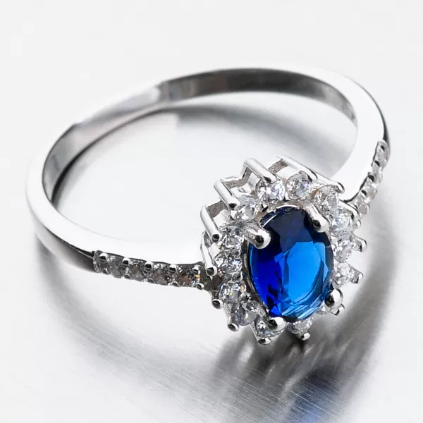 Stříbrný prsten se safírem a zirkony GST-11267