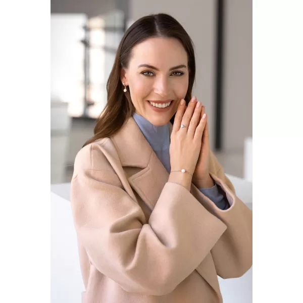 Stříbrný náramek se syntetickým opálem bílý kulatý 13019.1