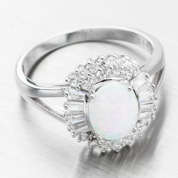 Stříbrný prsten s bílým opálem a se zirkony PKL-1028