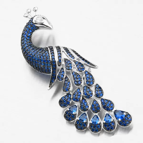 Stříbrná brož páv s modrými zirkony PKL-6008