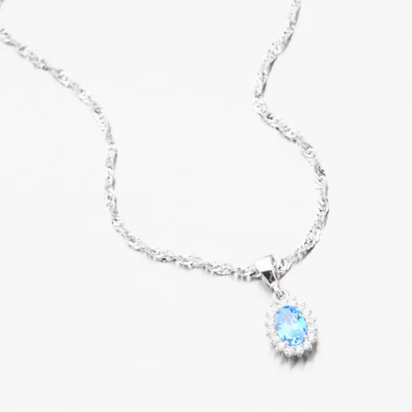 Přívěsek z bílého zlata s akvamarínem a se zirkony 13-406