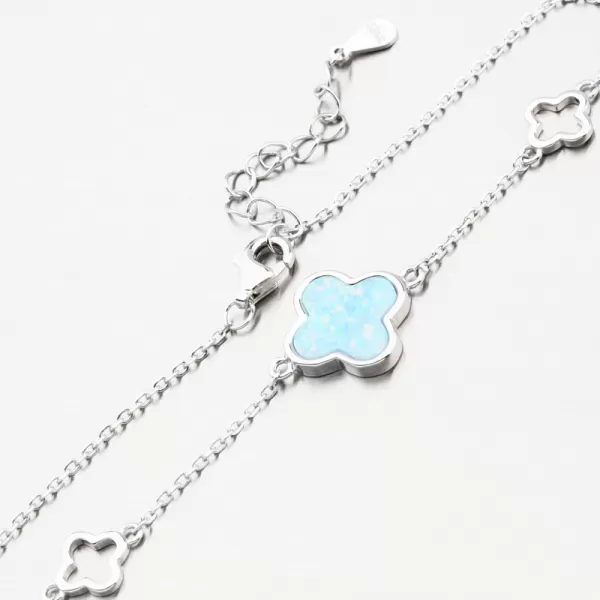 Stříbrný dámský náramek se čtyřlístky a modrým opálem PKL-4017